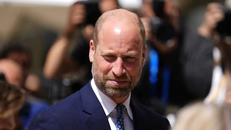 Prince William frowning