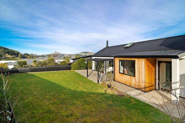 Black Caps bowler Jacob Duffy and his wife Tash love their home at 5 Goddard Way, in Sawyers Bay, but they need to move closer to family now that they have a newborn baby. Photo / Supplied