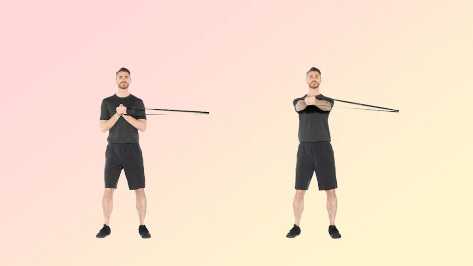 a photo of a man doing a pallof press