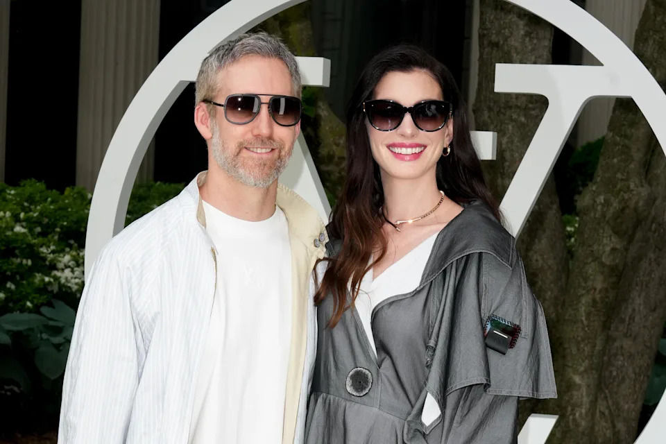 Adam Shulman and Anne Hathaway at the Louis Vuitton 2027 Cruise Collection Show on May 20, 2026 in New York, New York.