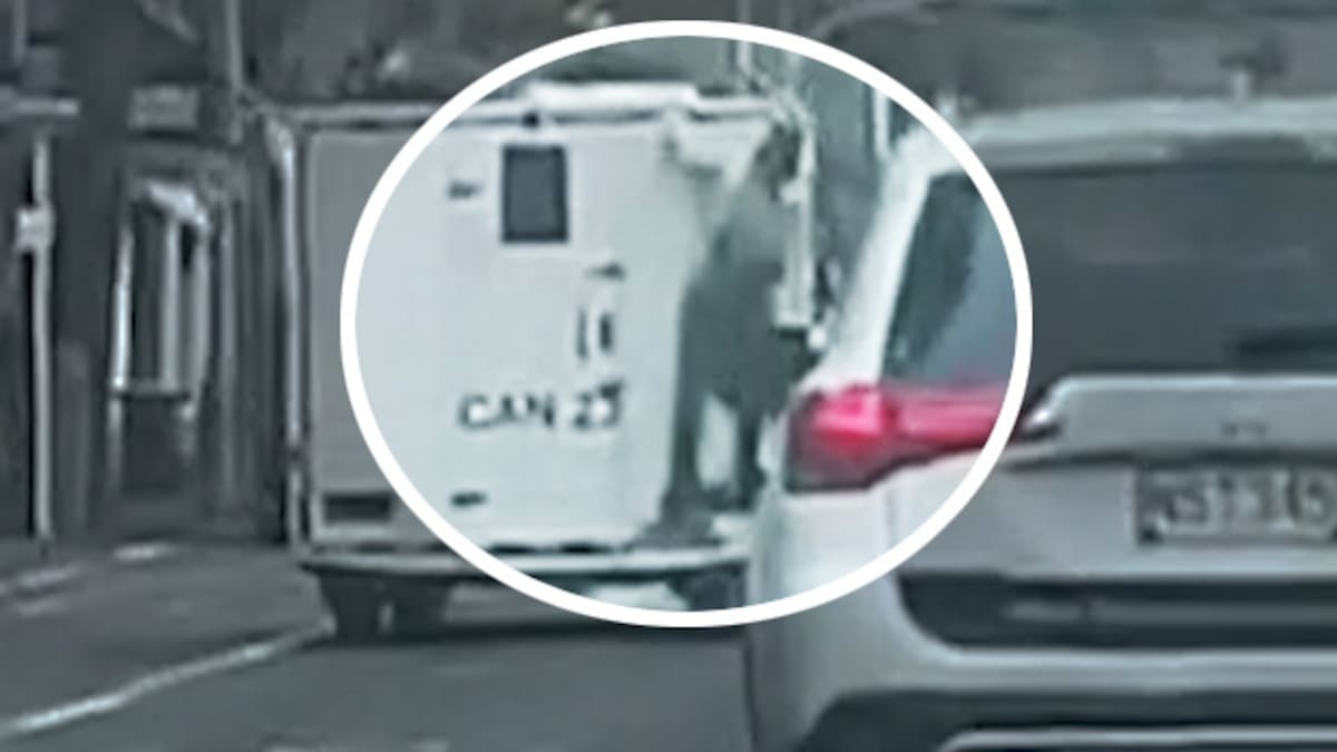 Man clings to back of moving Corrections van travelling through Auckland CBD