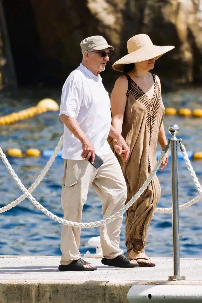 Robert De Niro and Tiffany Chen are seen leaving hotel Eden Roc