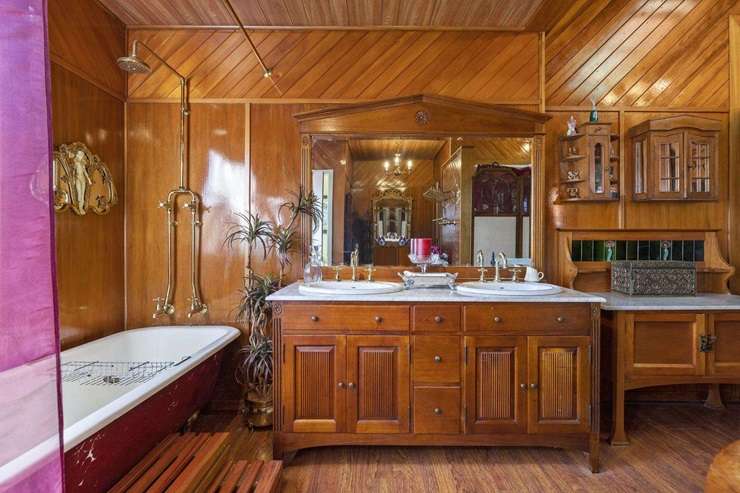 Jim Stuart and Cristine Leitch have listed their Edwardian-style home at 346 Tauwhare Road, in Matangi, Waikato. They want someone to buy their property and their vast collection of antiques. Photo / Supplied