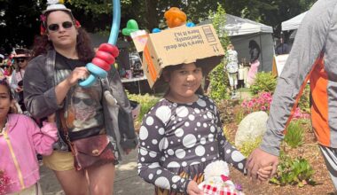 A little girl parades through Memorial Peace Park wearing her unique hat for the Mad Hatters Tea Party in support of mental health in Maple Ridge. (Colleen Flanagan/The News)