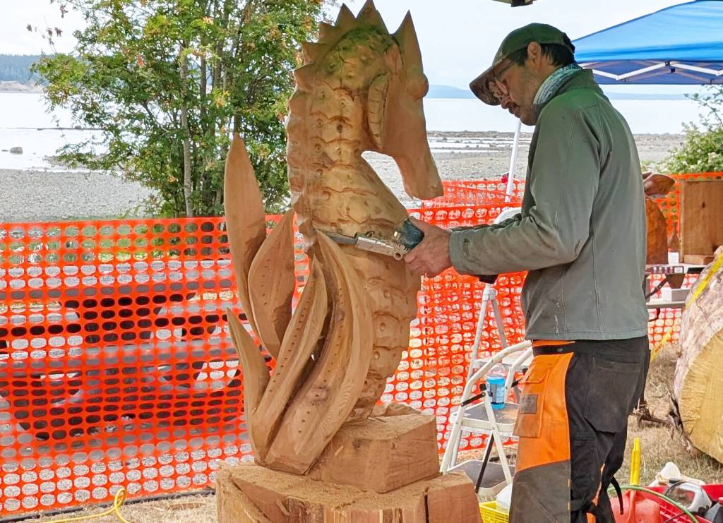 Newcomer Aaron Grant works on the smaller details of the seahorse at the Transformation on the Shore, June 25, 2026. (Kari Fredheim/Campbell River Mirror)