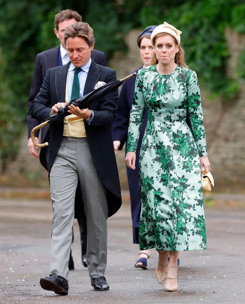 Beatrice looked elegant in a green, floral dress