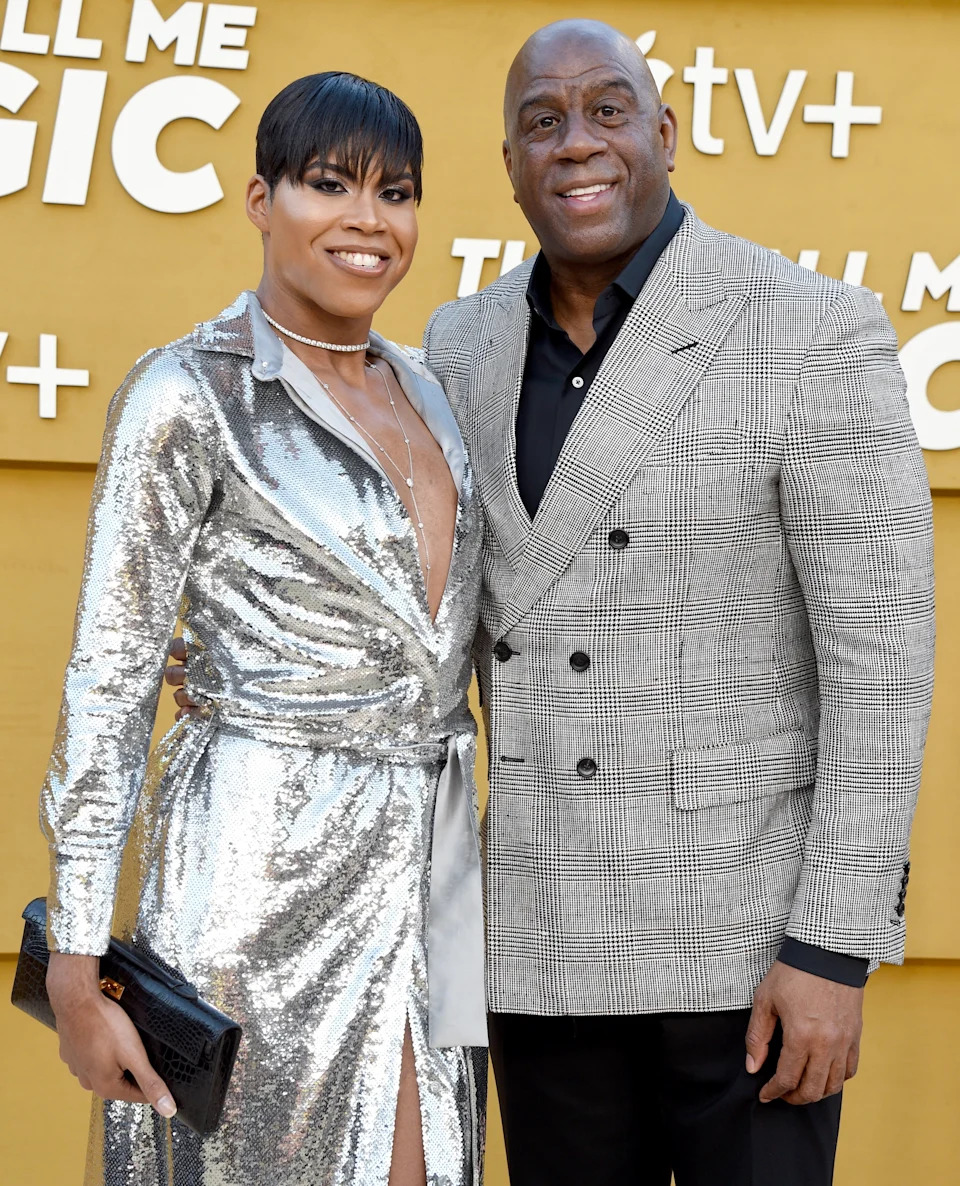 EJ Johnson and Magic Johnson at an event