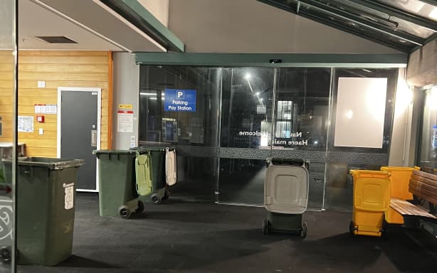 Wheelie bins in the entrance to Hutt Hospital put in place to catch water in June 2026.