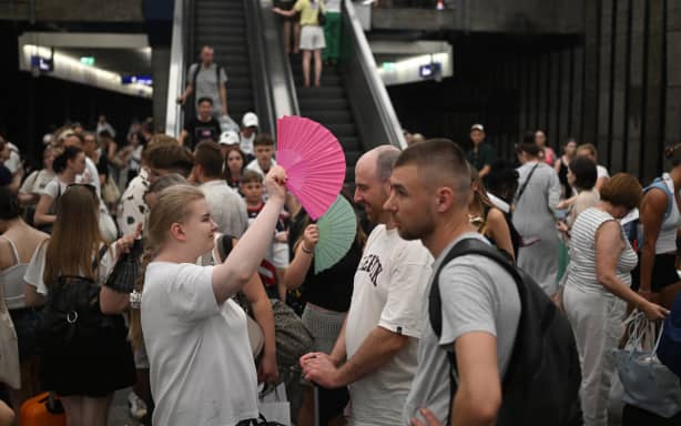 Passengers use hand fans waiting for trains delayed due to the heatwave at Warsaw Central railway station in Warsaw on June 28, 2026.
Poland surpassed its all-time heat record with temperatures reaching 40.5C, a spokeswoman for the Institute of Meteorology and Water Management (IMGW) told to AFP on June 28, 2026.