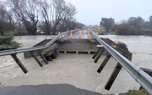 Tūranganui River bridge has been washed out following heavy rain, leaving around 460 homes with limited access, including Lake Ferry and Ngāwi.