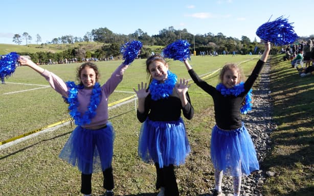 Sister act: Russell cheerleaders Wilder, 8, Skipper, 11, and Remy Saunders-Smeath, 8.
