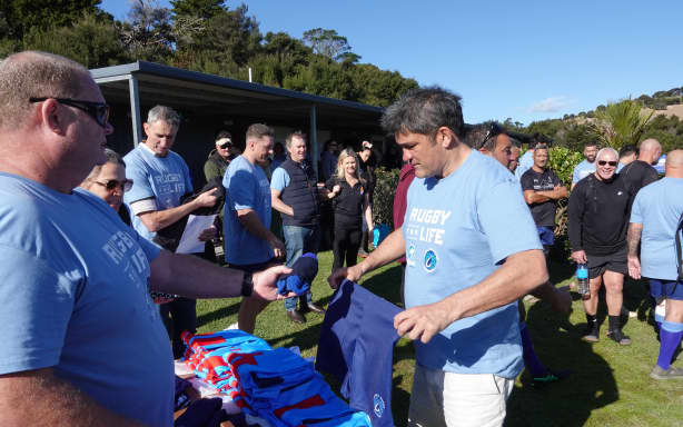 Russell captain and former All Black Taine Randell picks out his kit with help from Mark Osborne.
