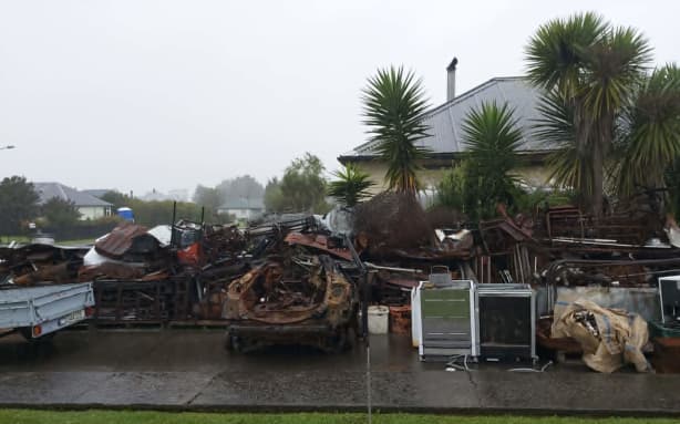 Westport man Danny Hakaraia has collected huge amounts of dumped rubbish from near a local beach, including around 8 tonne of steel.