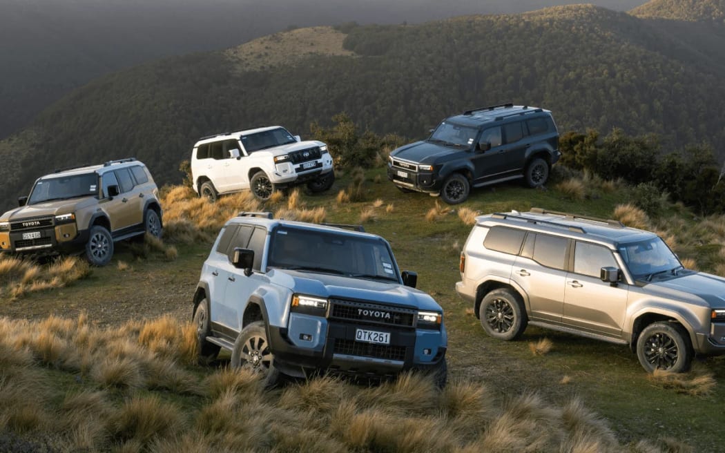 Five Toyota Prado cars.