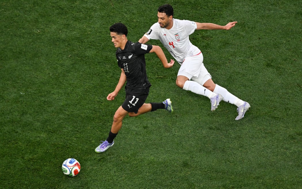 Eli Just of New Zealand and Shoja khalilzadeh of IR Iran.