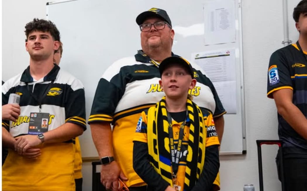 Andrew Grant and his son Connor spending time with the Hurricanes.