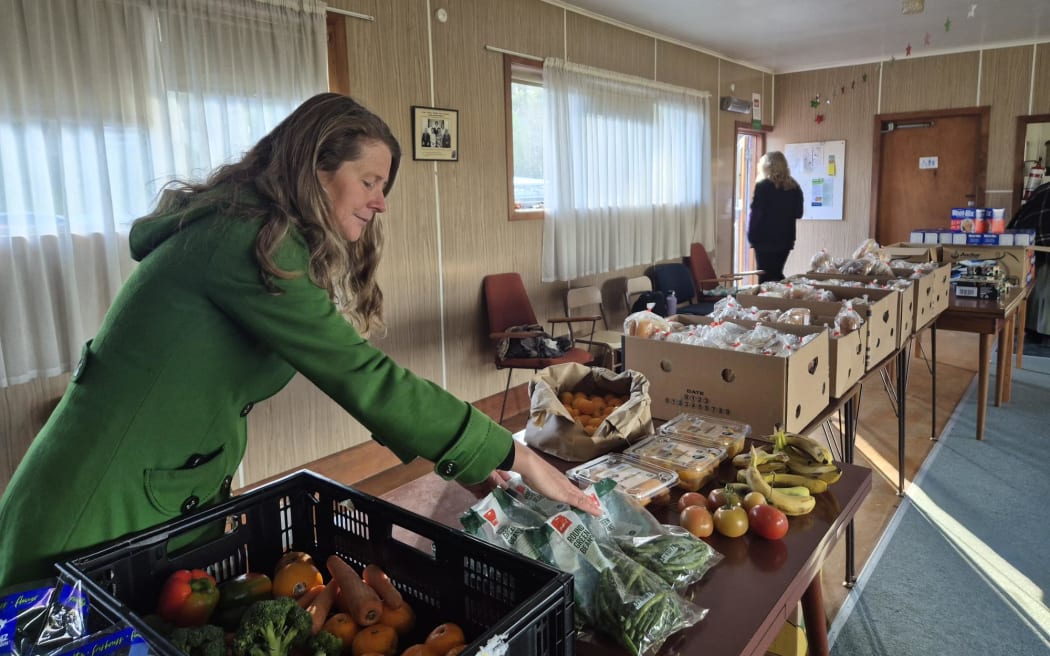 Jess Mackintosh volunteering at the Food Basket CHB.