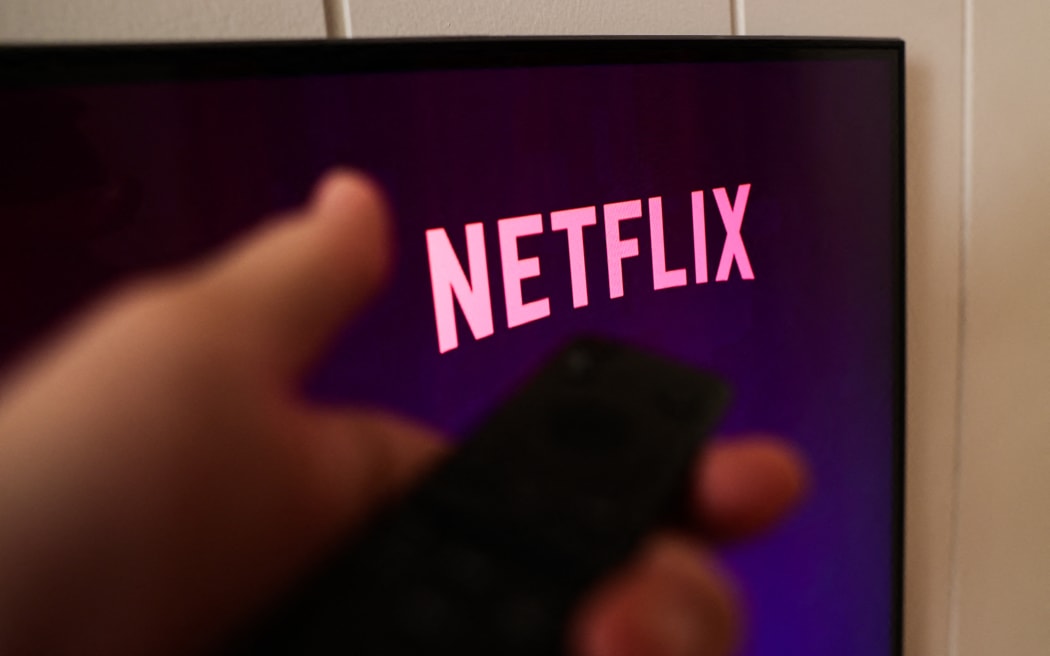 Netflix logo displayed on a tv screen is seen seen in this illustration photo taken in Norway on January 10, 2025. (Photo by Jakub Porzycki/NurPhoto) (Photo by Jakub Porzycki / NurPhoto via AFP)