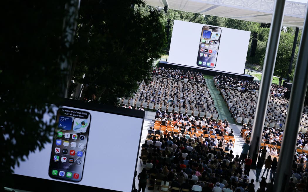 Attendees watch a presentation during Apple's annual Worldwide Developers Conference in Cupertino, California, on June 8.