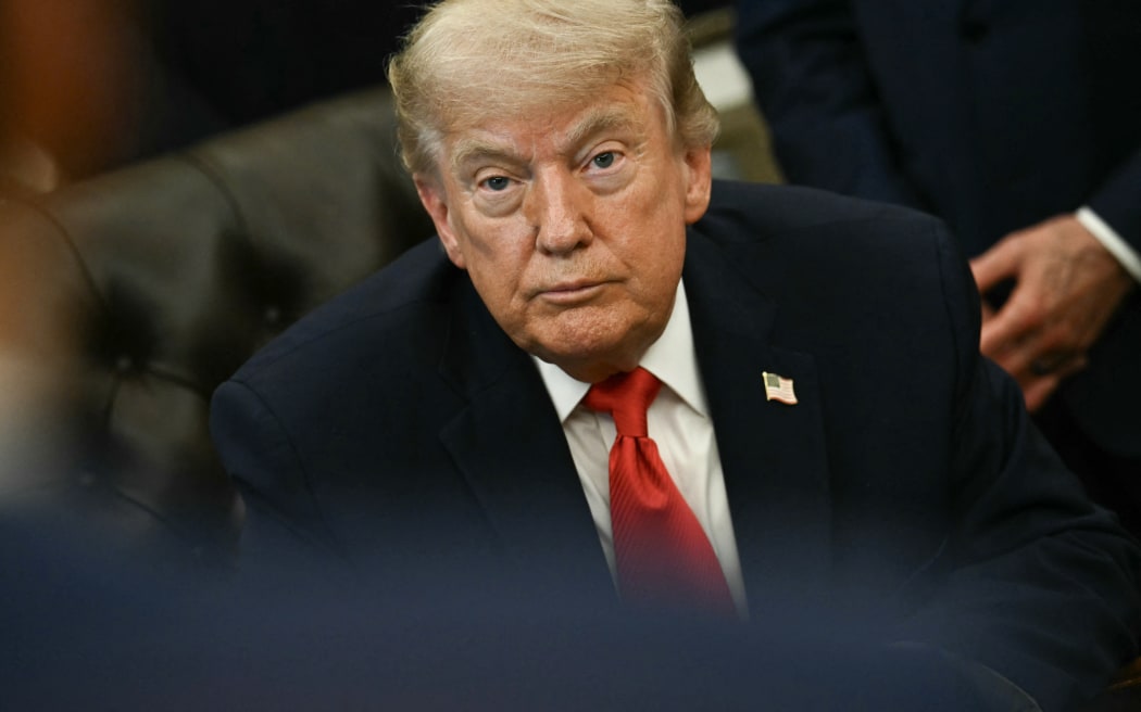 US President Donald Trump speaks before signing a proclamation in the Oval Office of the White House in Washington, DC, on June 11, 2026. (Photo by Kent NISHIMURA / AFP)
