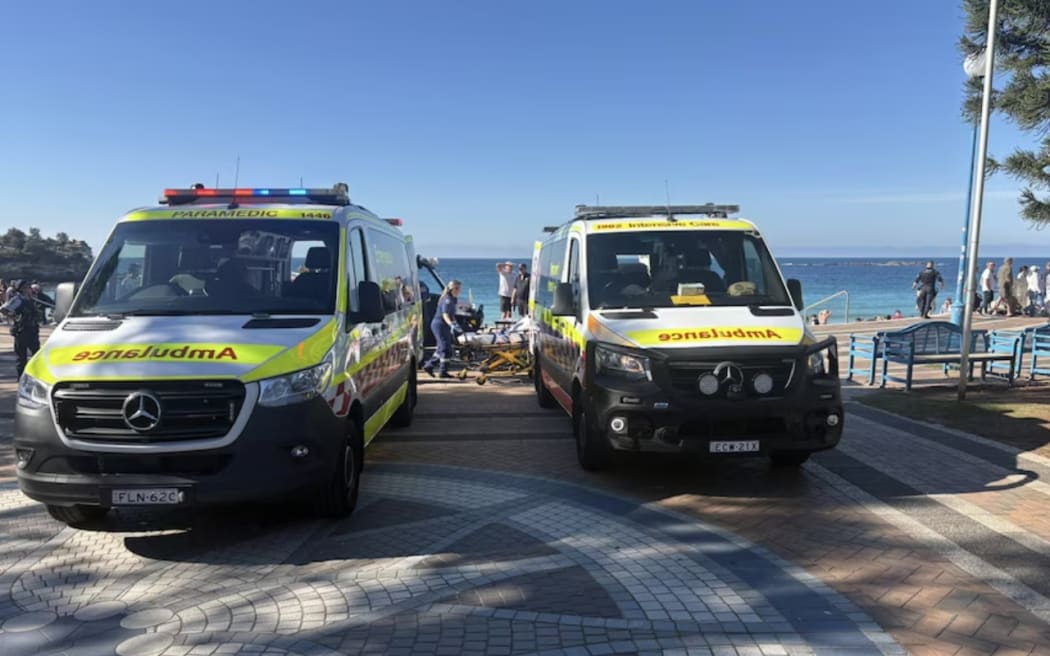 Authorities set up an exclusion zone as paramedics treated the woman. (Supplied: Shawn Buttling)
