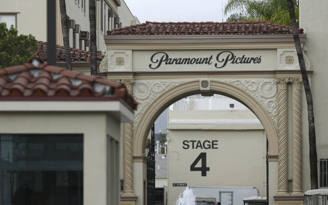 The Paramount Pictures logo displays above an entrance arch in Los Angeles, California, on February 17, 2026. Paramount Skydance attempts a hostile takeover bid of Warner Bros. (Photo by Michael Yanow/NurPhoto) (Photo by Michael Yanow / NurPhoto via AFP)