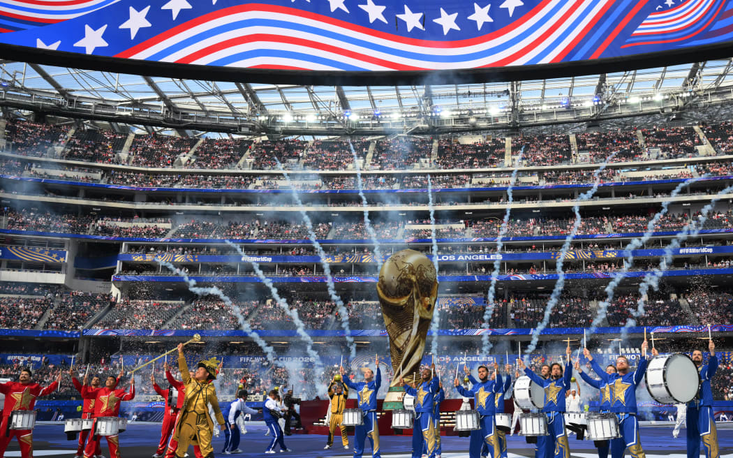 Artists perform during the opening ceremony of the 2026 World Cup football tournament ahead of the Group D football match between USA and Paraguay at the Los Angeles Stadium in Inglewood on June 12, 2026. (Photo by Patrick T. Fallon / AFP)