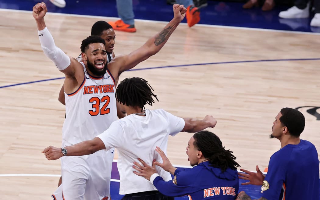 NEW YORK, NEW YORK - JUNE 10: Karl-Anthony Towns #32 of the New York Knicks celebrates after his team's 107-106 victory against the San Antonio Spurs in Game Four of the 2026 NBA Finals at Madison Square Garden on June 10, 2026 in New York City. NOTE TO USER: User expressly acknowledges and agrees that, by downloading and or using this photograph, User is consenting to the terms and conditions of the Getty Images License Agreement. Al Bello/Getty Images/AFP (Photo by AL BELLO / GETTY IMAGES NORTH AMERICA / Getty Images via AFP)