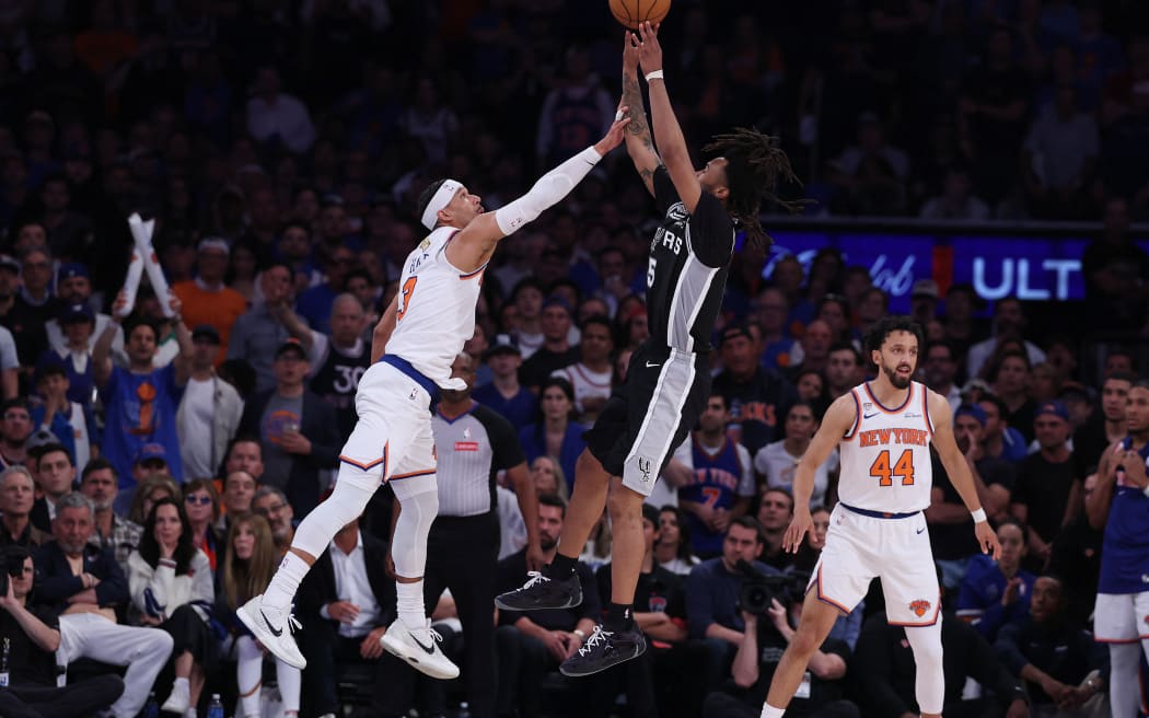 NEW YORK, NEW YORK - JUNE 10: Stephon Castle #5 of the San Antonio Spurs shoots against Josh Hart #3 of the New York Knicks in Game Four of the 2026 NBA Finals at Madison Square Garden on June 10, 2026 in New York City. NOTE TO USER: User expressly acknowledges and agrees that, by downloading and or using this photograph, User is consenting to the terms and conditions of the Getty Images License Agreement. Al Bello/Getty Images/AFP (Photo by AL BELLO / GETTY IMAGES NORTH AMERICA / Getty Images via AFP)