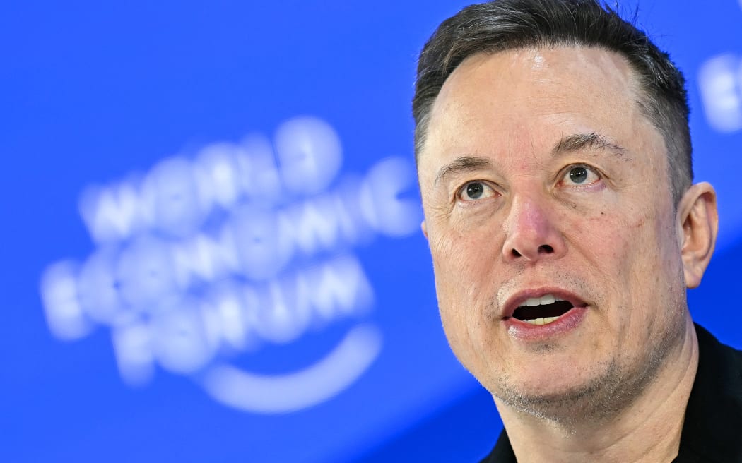 CEO of SpaceX and Tesla, South African-Canadian-US businessman Elon Musk speaks during the World Economic Forum (WEF) annual meeting in Davos on January 22, 2026. The World Economic Forum takes place in Davos from January 19 to January 23, 2026. (Photo by Fabrice COFFRINI / AFP)
