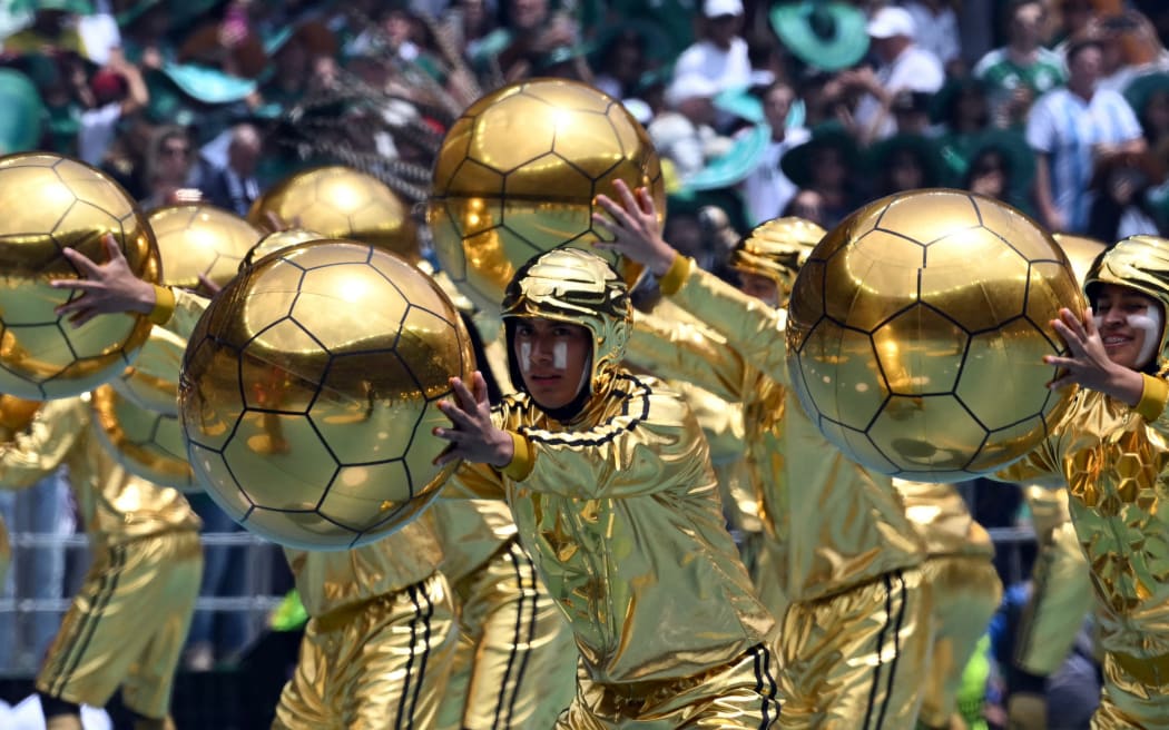 Artists perform during the opening ceremony ahead of the 2026 World Cup Group A football match between Mexico and South Africa at the Mexico City Stadium in Mexico City on June 11, 2026. (Photo by Yuri CORTEZ / AFP)