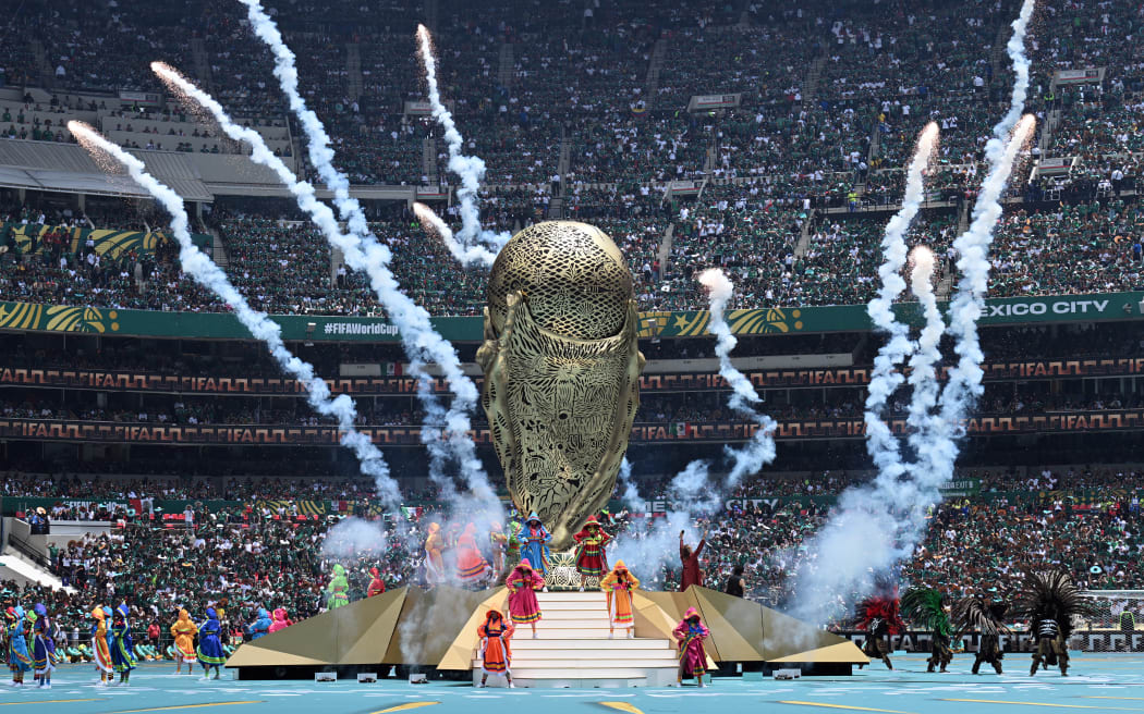 Artist perform during the opening ceremony ahead of the 2026 World Cup Group A football match between Mexico and South Africa at the Mexico City Stadium in Mexico City on June 11, 2026. (Photo by YURI CORTEZ / AFP)