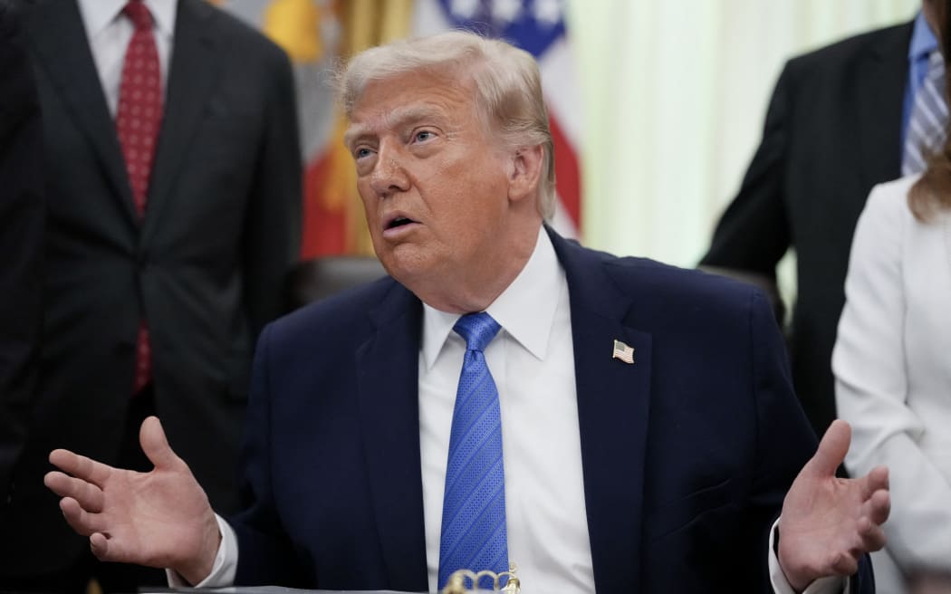 US President Donald Trump speaks during a signing ceremony for the "Secure America Act" in the Oval Office of the White House in Washington, DC, on June 10, 2026. The bill provides around $38 billion for Immigration and Customs Enforcement (ICE), $26 billion for Border Patrol and another $5 billion for unforeseen costs, effectively ensuring a steady flow of money for Trump's deportation agenda through fiscal 2029. (Photo by Ken Cedeno / AFP)