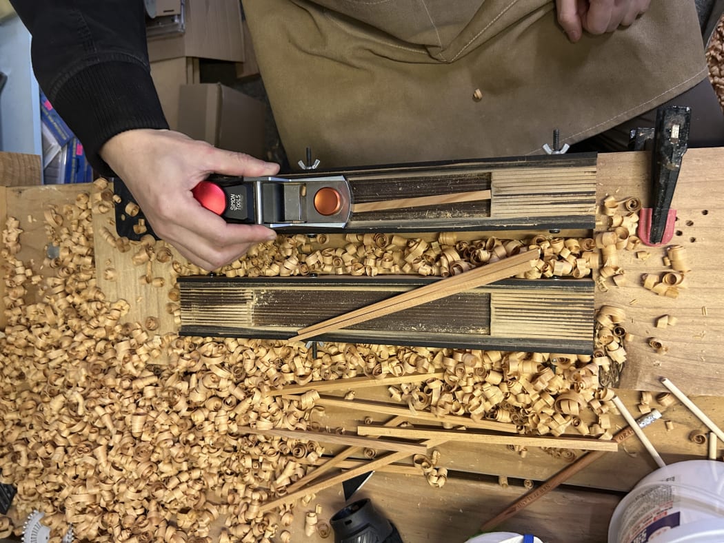 Picture shows two planers and a handmade mold. With a pair of roughly shaped chopsticks sitting on top.
