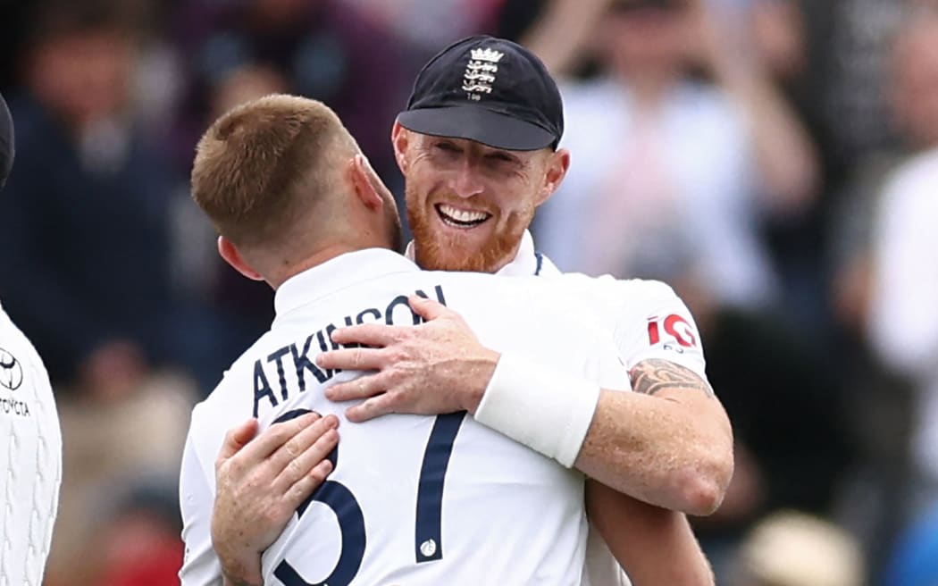 England's captain Ben Stokes congratulates England's Gus Atkinson, first Test against New Zealand, 2026.