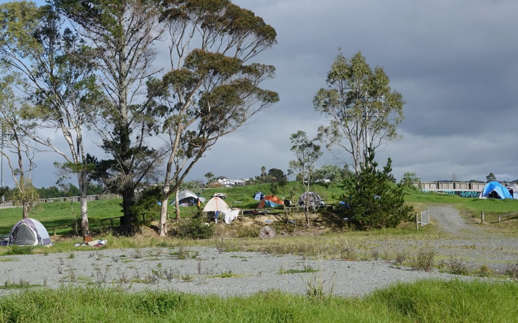 Up to 40 people, including children, live in tents and improvised shelters on a disused sports ground in Whangārei.