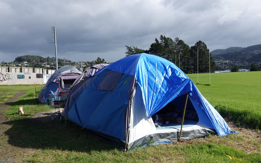 George and Barbara’s tent is one of at least 20 pitched on a disused sports ground in Whangārei.