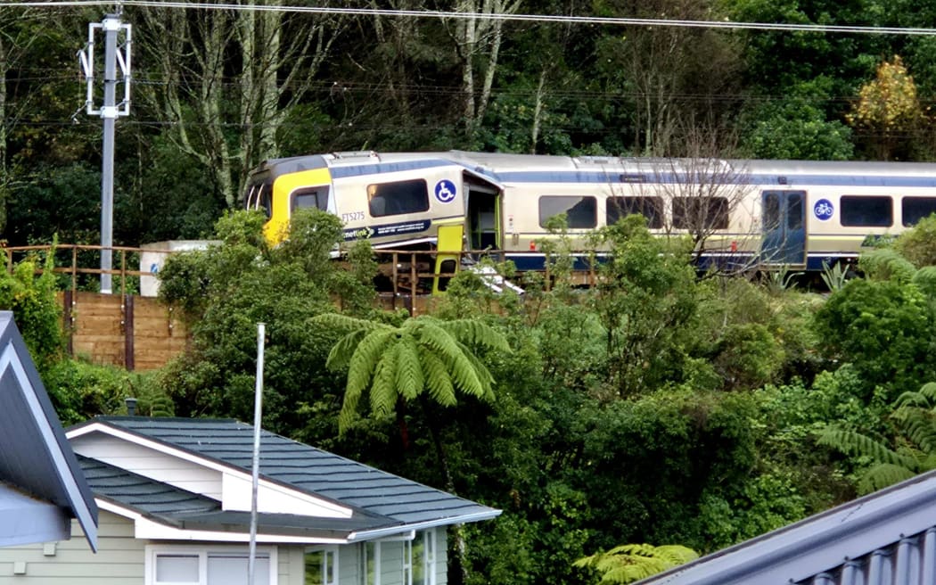 The aftermath of the train derailment near Khandallah, Wellington, shown on 7 June, 2026. The train remains on the scene as investigators work to find the cause.