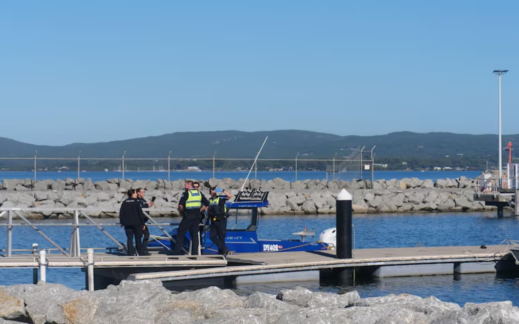 Australian police at the scene to investigate a fatal shark attack at Michaelmas Island, near Albany, on Western Australia's southern coast.