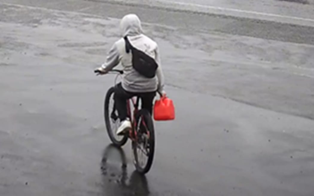 The alleged offender was captured on a dark red mountain bike at a Maungatapere GAS petrol station at 8.04am on 1 June.