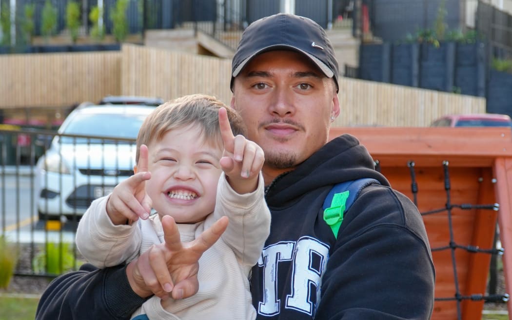 Kauika Rd’s new tenants include Tamati Herewini-Murray and his two-year-old whāngai son.