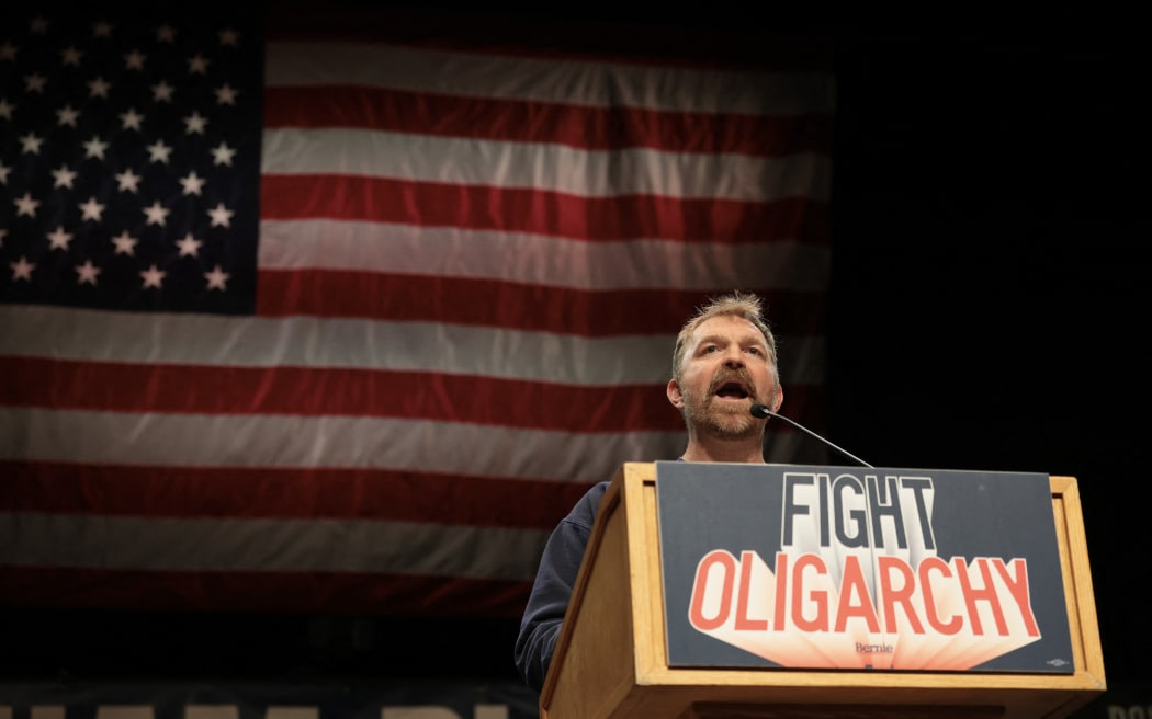 ORONO, MAINE - MAY 24: Democratic U.S. Senate candidate Graham Platner speaks at a “Fighting Oligarchy” tour stop held by Sen. Bernie Sanders (I-VT) at the Collins Center for the Arts on the University of Maine campus on May 24, 2026 in Orono, Maine. Platner is the presumptive Democratic nominee and will face incumbent Sen. Susan Collins (R-ME) for Maine's U.S. Senate seat in the general election.   Joe Raedle/Getty Images/AFP (Photo by JOE RAEDLE / GETTY IMAGES NORTH AMERICA / Getty Images via AFP)