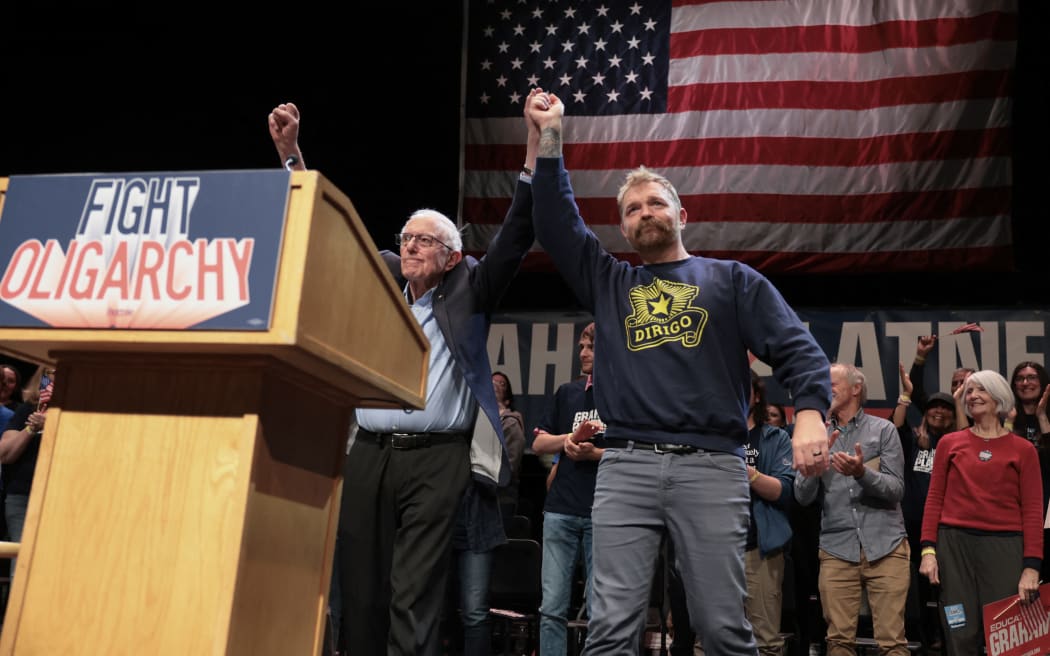 ORONO, MAINE - MAY 24: Sen. Bernie Sanders (I-VT) and Democratic U.S. Senate candidate Graham Platner together during a “Fighting Oligarchy” tour stop at the Collins Center for the Arts on the University of Maine campus on May 24, 2026 in Orono, Maine. Platner is the presumptive Democratic nominee and will face incumbent Sen. Susan Collins (R-ME) for Maine's U.S. Senate seat in the general election.   Joe Raedle/Getty Images/AFP (Photo by JOE RAEDLE / GETTY IMAGES NORTH AMERICA / Getty Images via AFP)