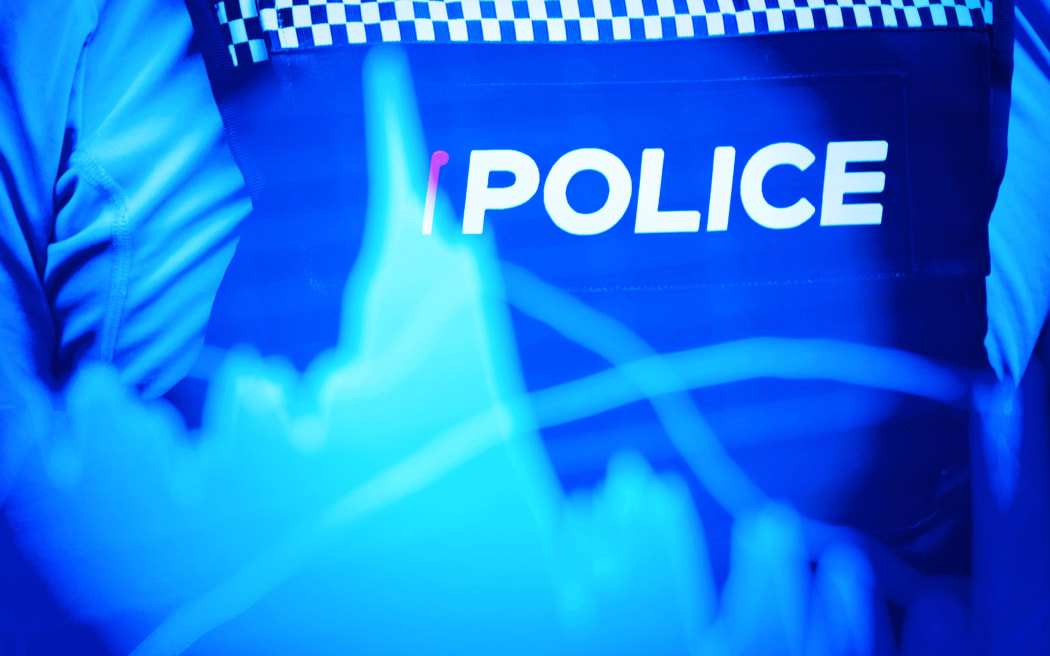 Stylised composite of police officer and charts.