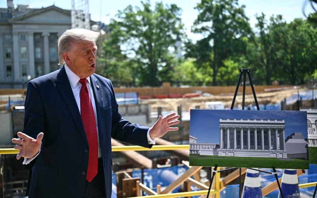 US President Donald Trump speaks to the press near the construction site of his proposed ballroom at the White House in Washington, DC, on May 19, 2026. (Photo by Kent NISHIMURA / AFP)