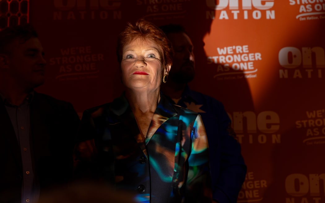 ALBURY, AUSTRALIA - MAY 09: One Nation leader, Pauline Hanson, stands on stage as her party wins the Farrer by-election on May 9, 2026 in Albury, Australia. The May 9 contest, triggered by Sussan Ley's resignation after being ousted as Liberal leader by Angus Taylor in February, has since evolved into a rare four-cornered race between the Liberals, the Nationals, an independent and One Nation — with polling suggesting the minor party could secure as much as 29 percent of the primary vote in the sprawling rural electorate. (Photo by Jesse Thompson/Getty Images)