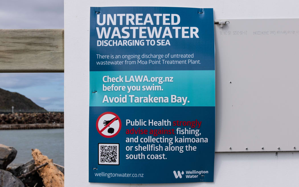 Signs on Wellington's South Coast about the wastewater spill