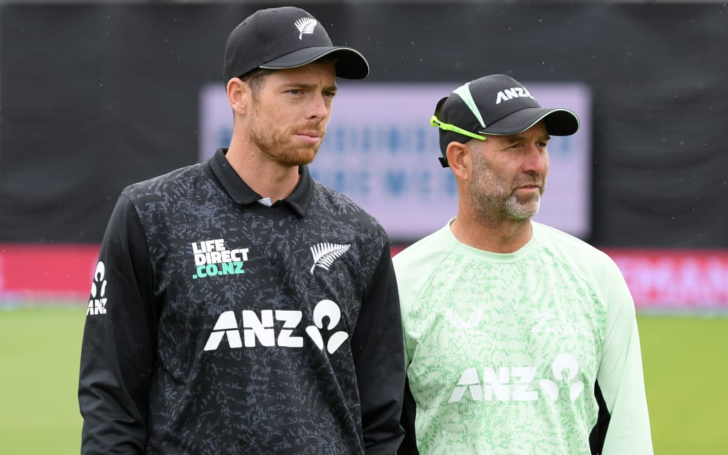 Mitchell Santner (L) and coach Rob Walter.