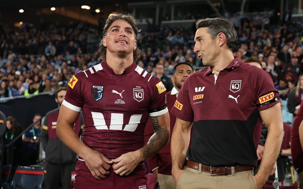 SYDNEY, AUSTRALIA - JULY 09: Reece Walsh of the Maroons and Billy Slater, Maroons head coach celebrate winning after game three of the Men's State Of Origin series between New South Wales Blues and Queensland Maroons at Accor Stadium on July 09, 2025 in Sydney, Australia. (Photo by Cameron Spencer/Getty Images)