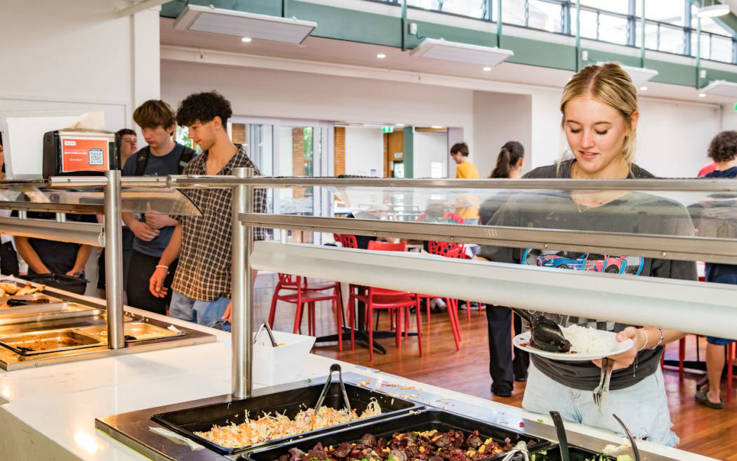 Students in the dining hall at University Hall accommodation.